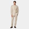Sand Herringbone Havana Suit - This double-breasted sand-hued suit features a relaxed, natural shoulder and is crafted in a slim fit with with minimal detailing and accompanying flat-front trousers for a timeless appeal.
