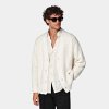 Off-White Crochet Oversized Cardigan - With its broadly textured crochet construction and oversized fit, this heavy off-white cardigan is among the most dynamic of this season's knits. Featuring a deep V-neck collar, 4-button closure, and thickly ribbed a