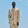 Sand Herringbone Havana Suit - This double-breasted sand-hued suit features a relaxed, natural shoulder and is crafted in a slim fit with with minimal detailing and accompanying flat-front trousers for a timeless appeal.